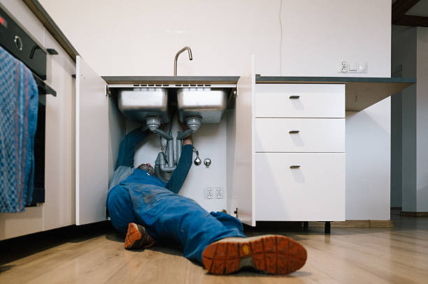 Professional Drain Cleaning technician working in Destin, FL